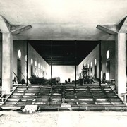 Adaptace barokní Jízdárny Pražského hradu pro výstavní účely v letech 1948-1949. Zahajovací expozicí byla Československý lid a jeho kraj v životě, práci a zápasu
